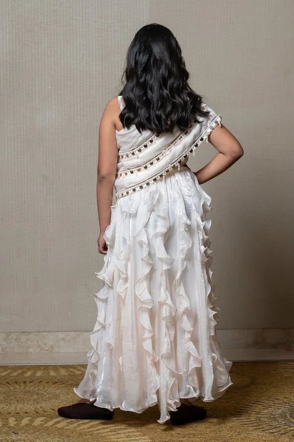 Elegant ivory one-shoulder gown with cascading ruffles and sequin embellishments, perfect for making a chic statement at any special occasion