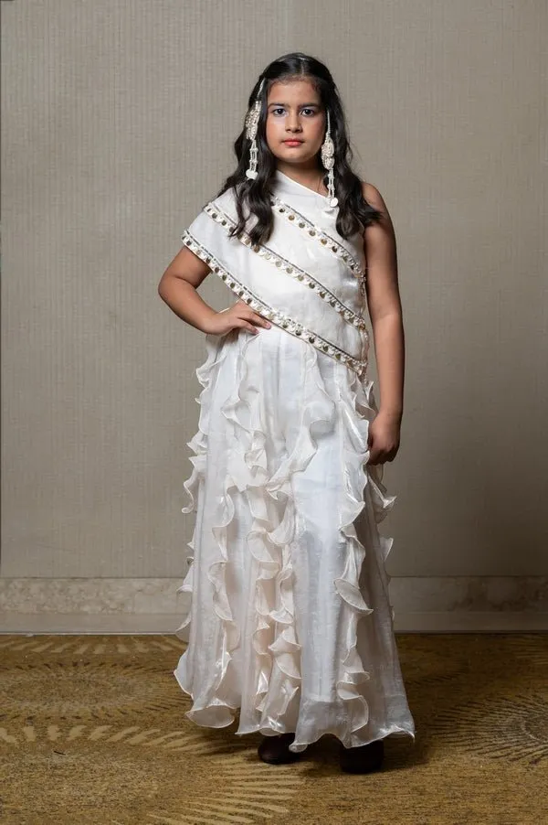 Elegant ivory one-shoulder gown with cascading ruffles and sequin embellishments, perfect for making a chic statement at any special occasion