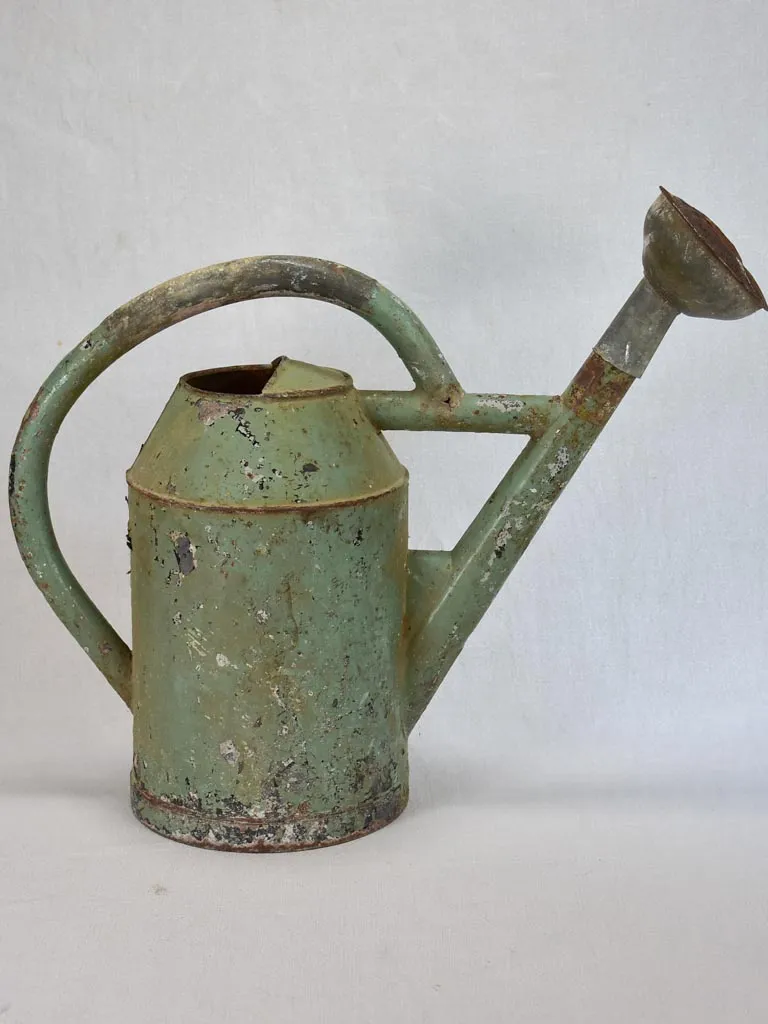 French watering can with green patina