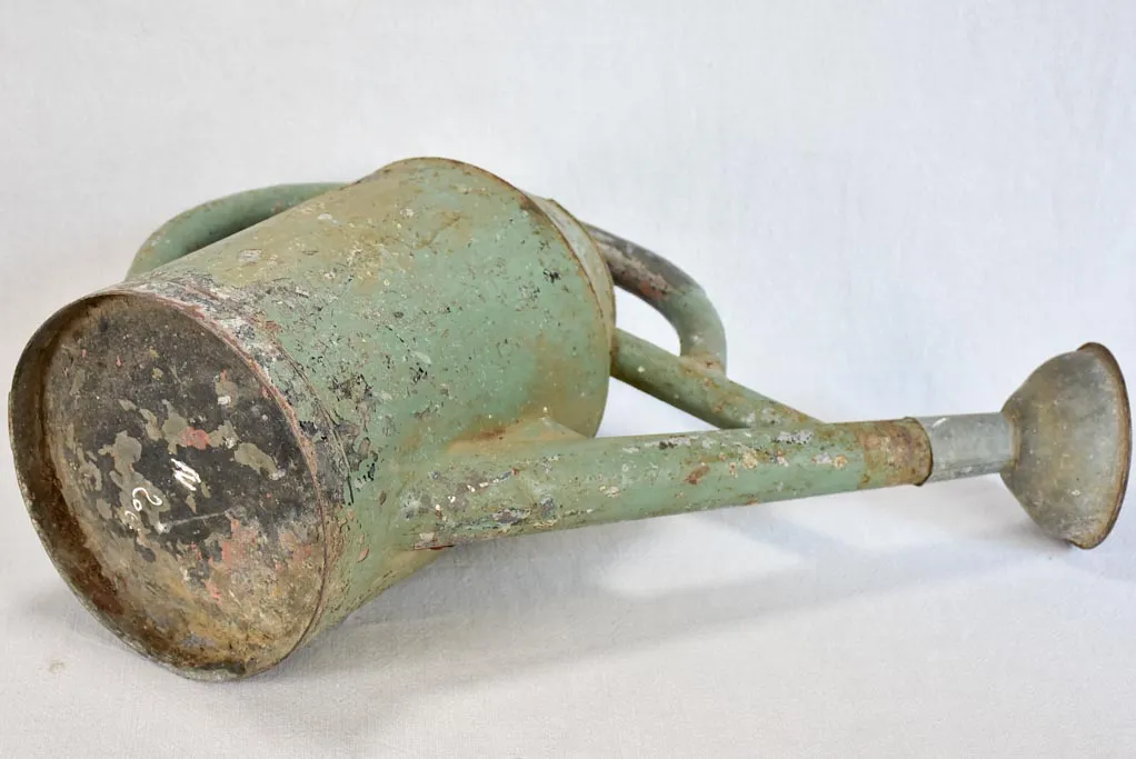 French watering can with green patina