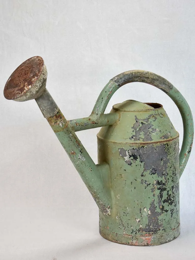 French watering can with green patina