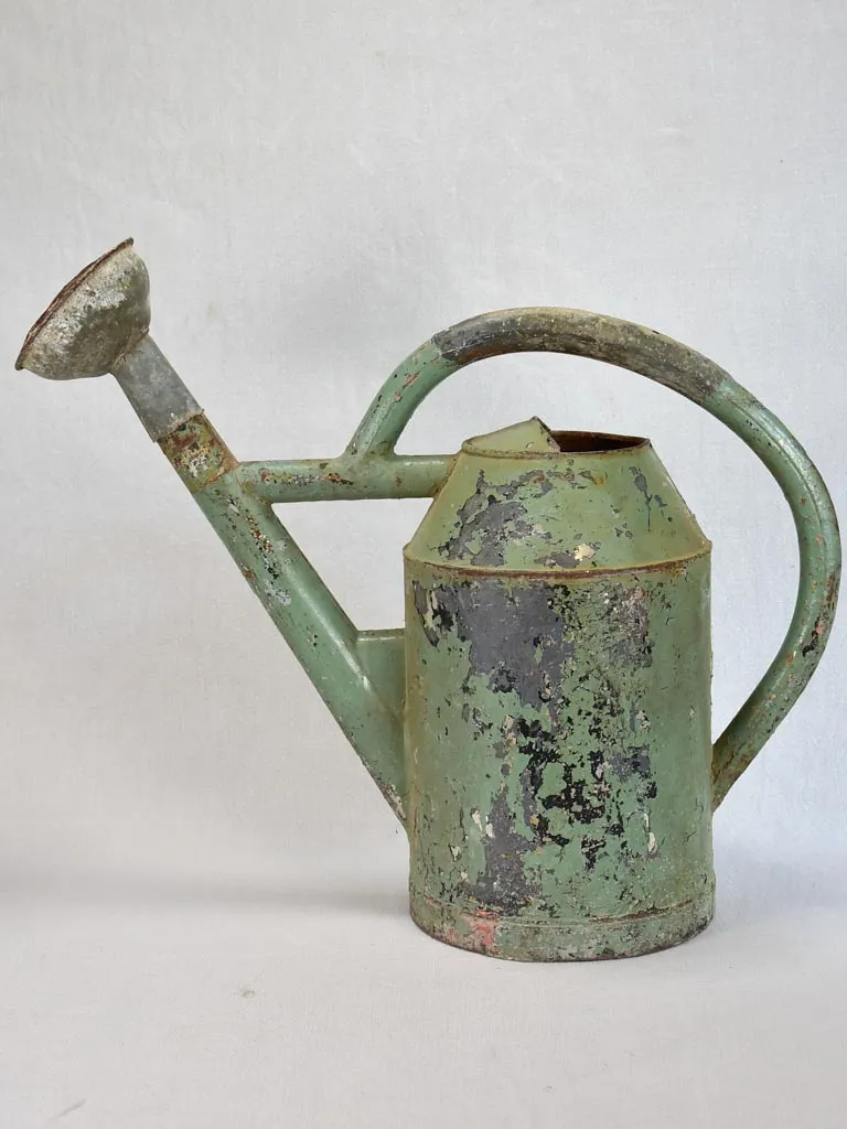 French watering can with green patina