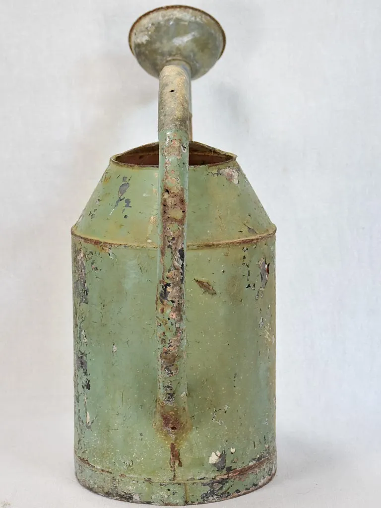 French watering can with green patina